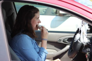 Senior Lyndsey Holman said she usually ends up eating in her car on her way to Summit Tech because she doesn't have enough time to stop, sit down and eat her lunch. Photo by Katie Britton-Mehlisch.